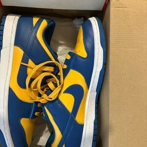 Men Nike dunks low in Blue and Yellow